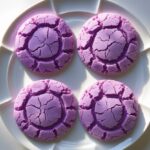 Ube Crinkle Cookies – Soft & Stunning Filipino Favorite (Easy Recipe) 6 Ube crinkle cookies on a white plate for recipe card
