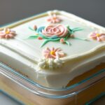 Bento Cake Recipe – How to Make Adorable Mini Cakes 6 decorated bento cake with buttercream floral design in clear lunchbox